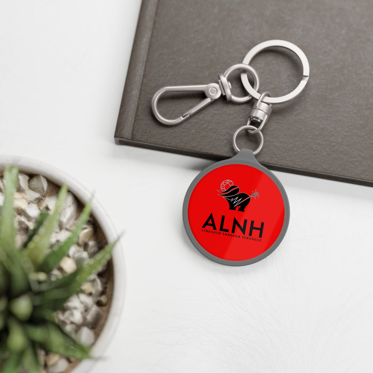 ALNH Strength Through Struggle Keyring Tag